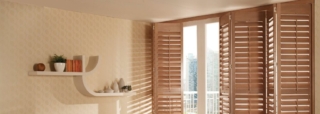 Wooden shutters in a bathroom in Brighton & Hove